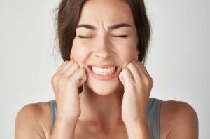 Read more about the article Teeth Grinding & Jaw Pain? Here’s What Your Dentist Wants You to Know